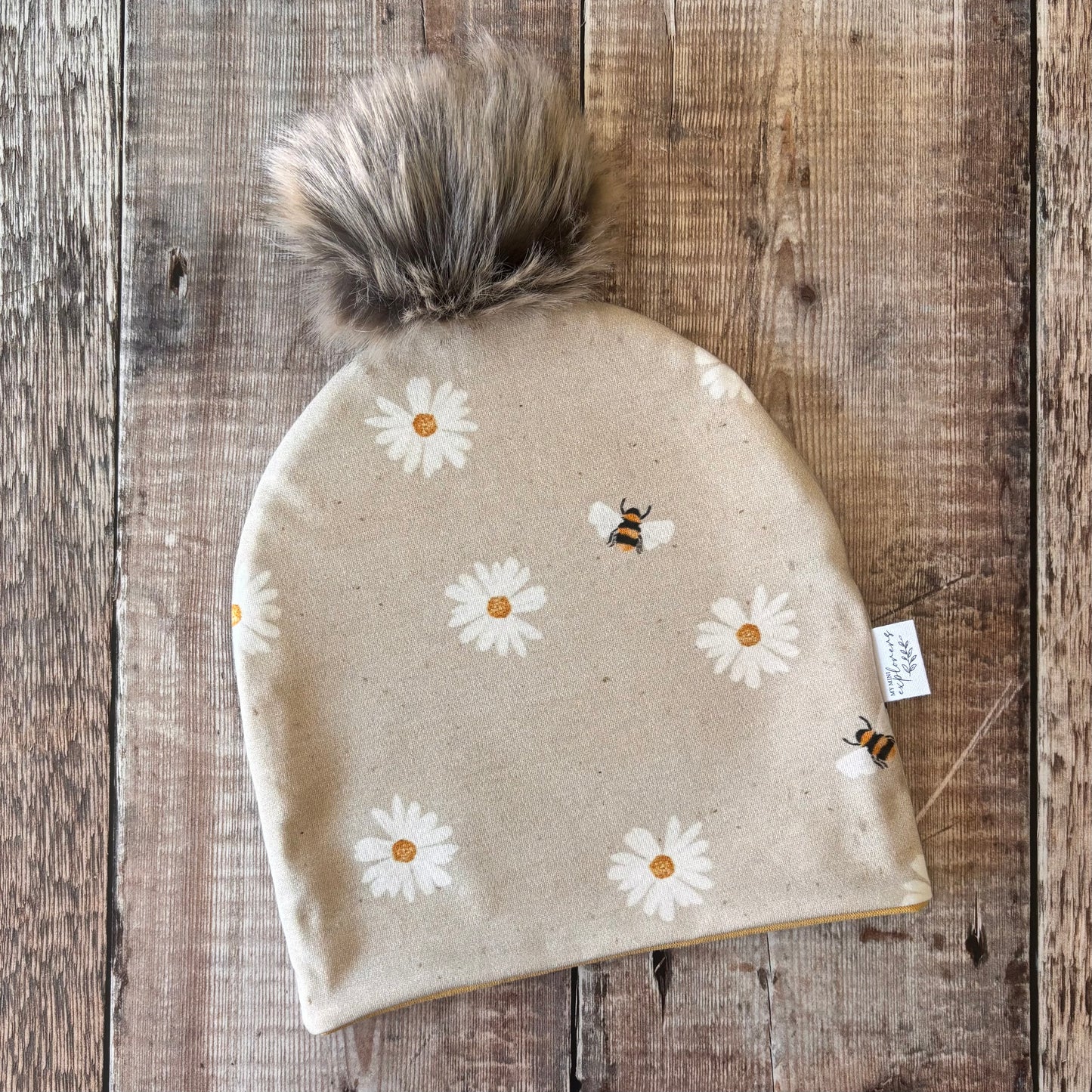 Large Daisies & Bees Bobble Hat 2-4 years (Gold inside)