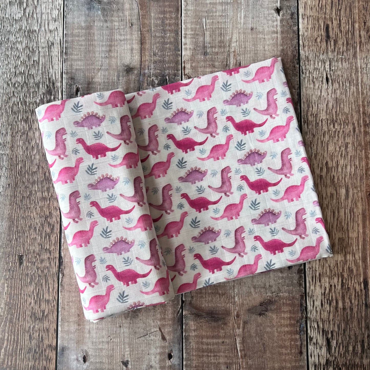 Pink Dinos Muslin Swaddle Blanket