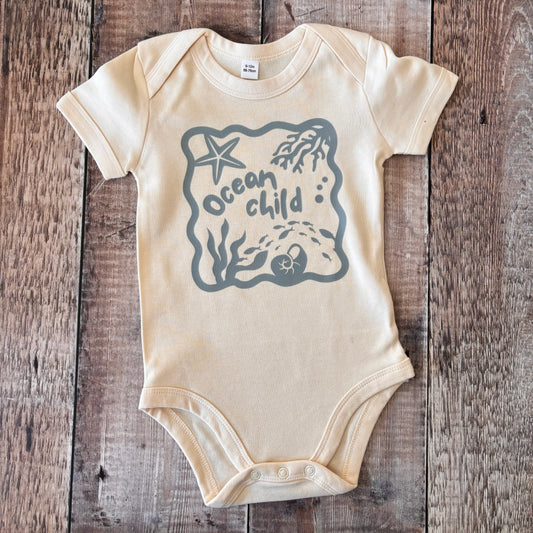 Ocean child (blue) short sleeve bodysuit 6-12m (natural)