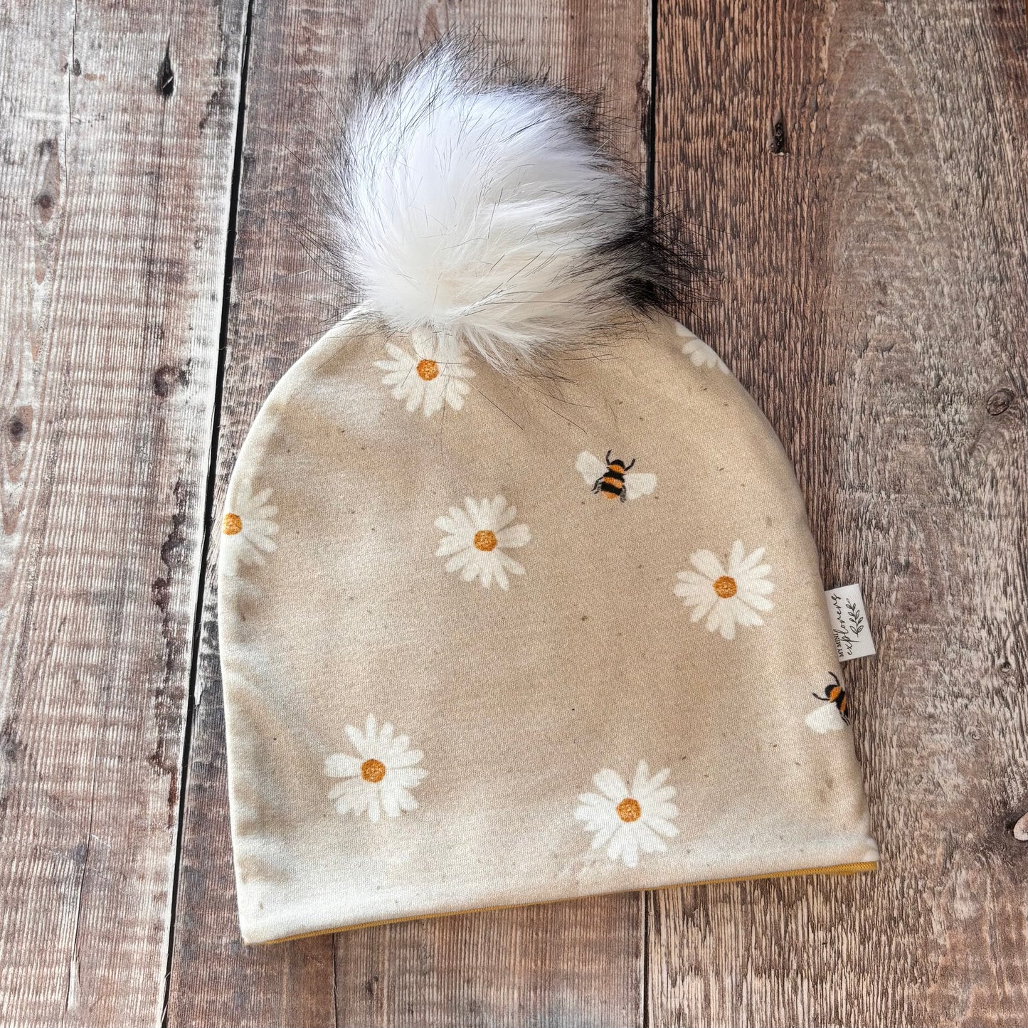 Large Daisies & Bees Bobble Hat 2-4 years (Gold inside)