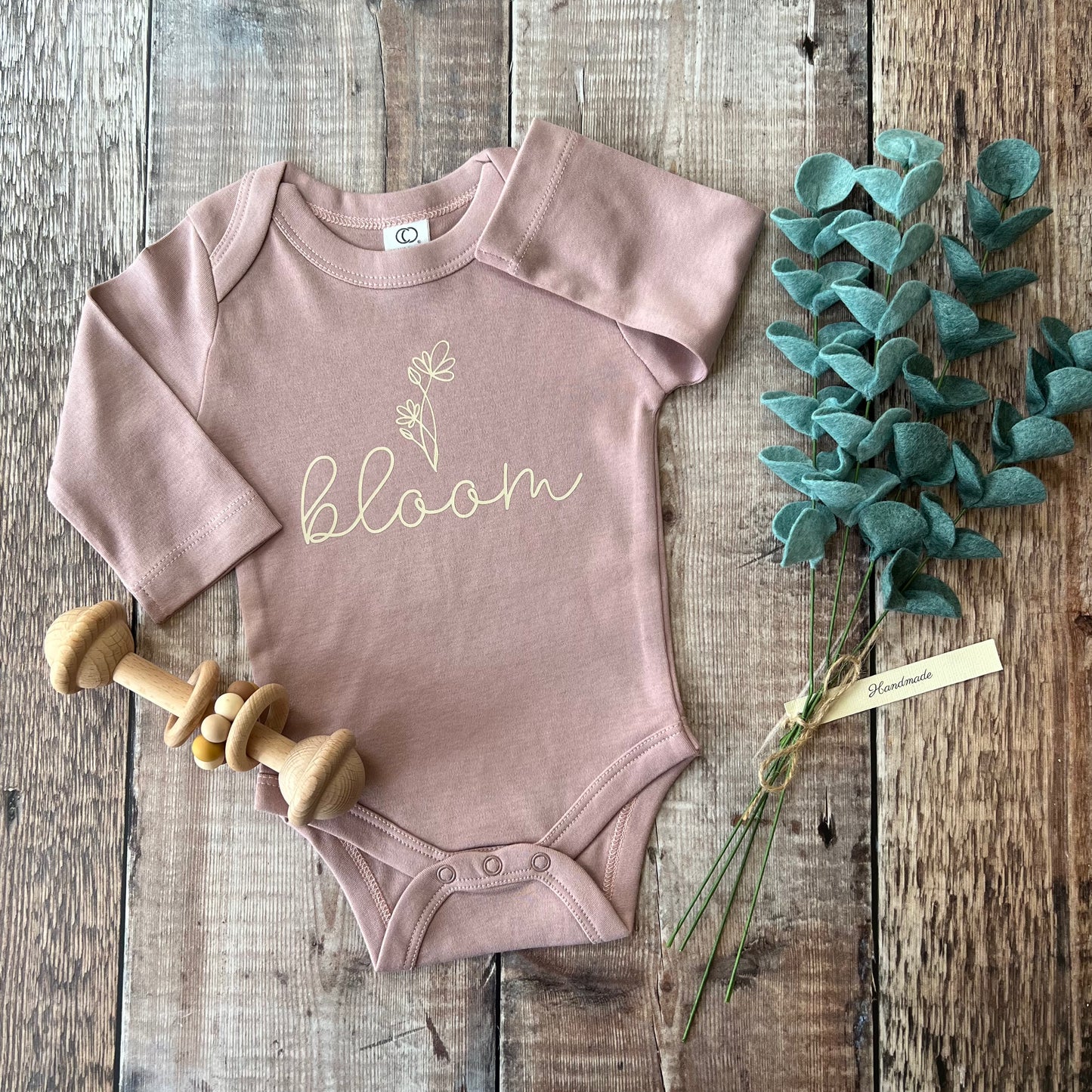 Bloom mauve bodysuit 0-3m
