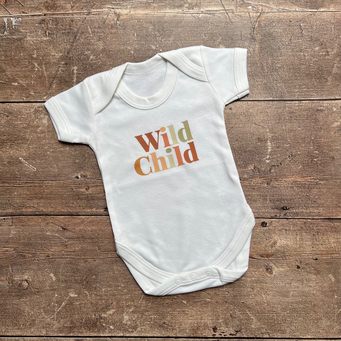 Wild Child bodysuit 0-3m